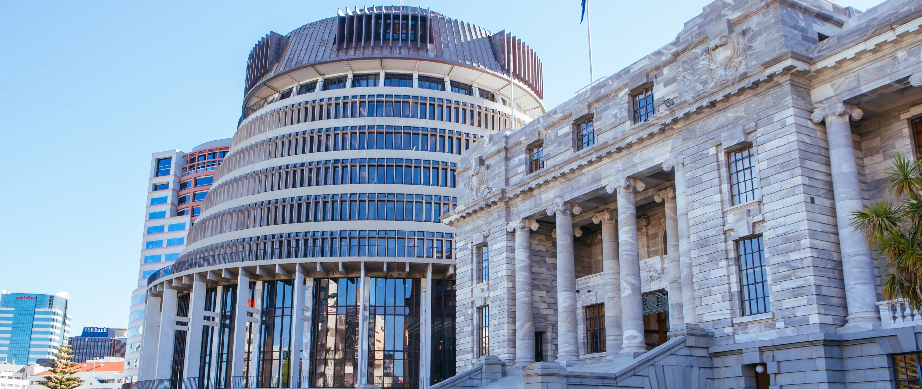 Exterior shot of a large government building.
