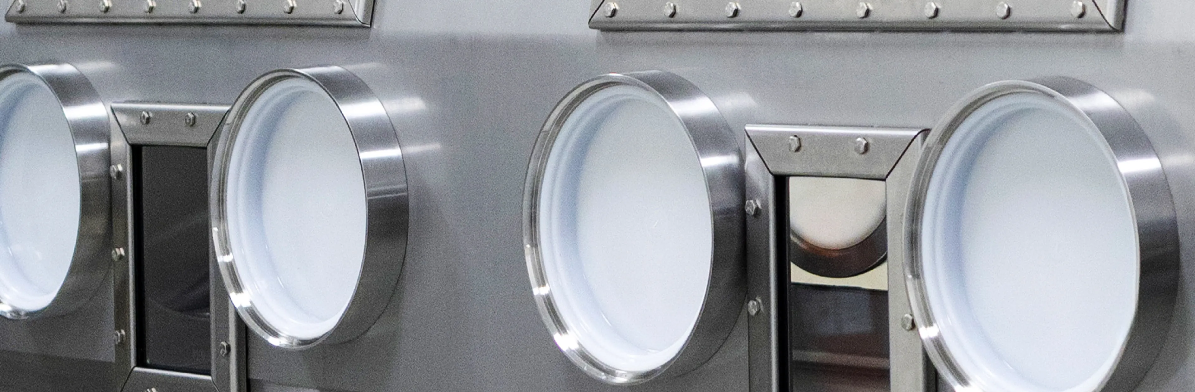 Controlled-environment glovebox system used for nuclear manufacturing and material handling