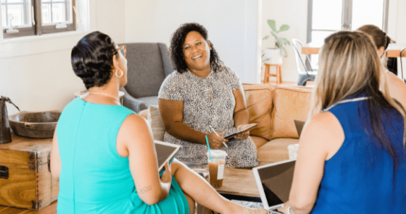 Four early childhood educators in meeting