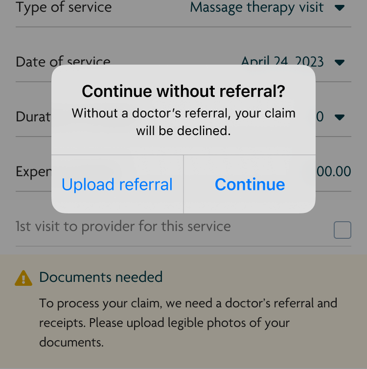 Version 1 of a popup alert warning users that their claim will be declined if they proceed without a referral.