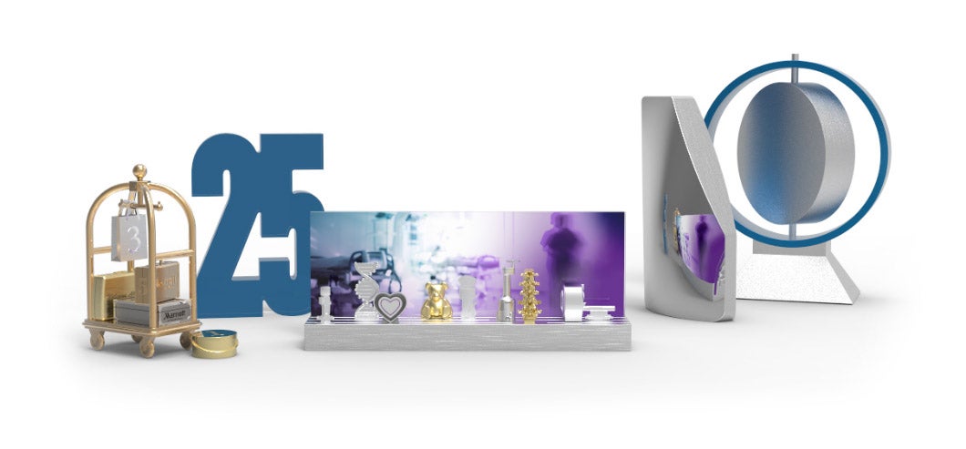 A selection of custom symbolic awards designed by O.C. Tanner for companies