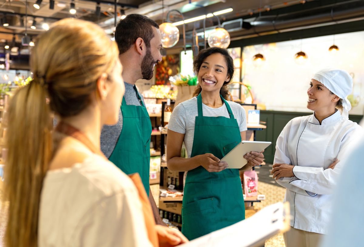 Retail employees in a team meeting