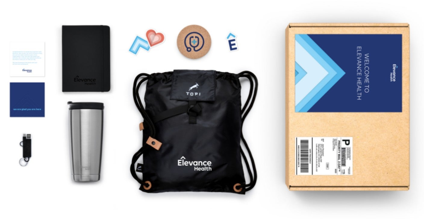 Company branded swag box with a variety of gifts