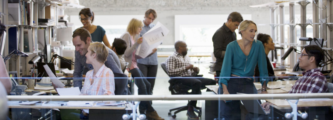 Employees collaborating together in an office space.