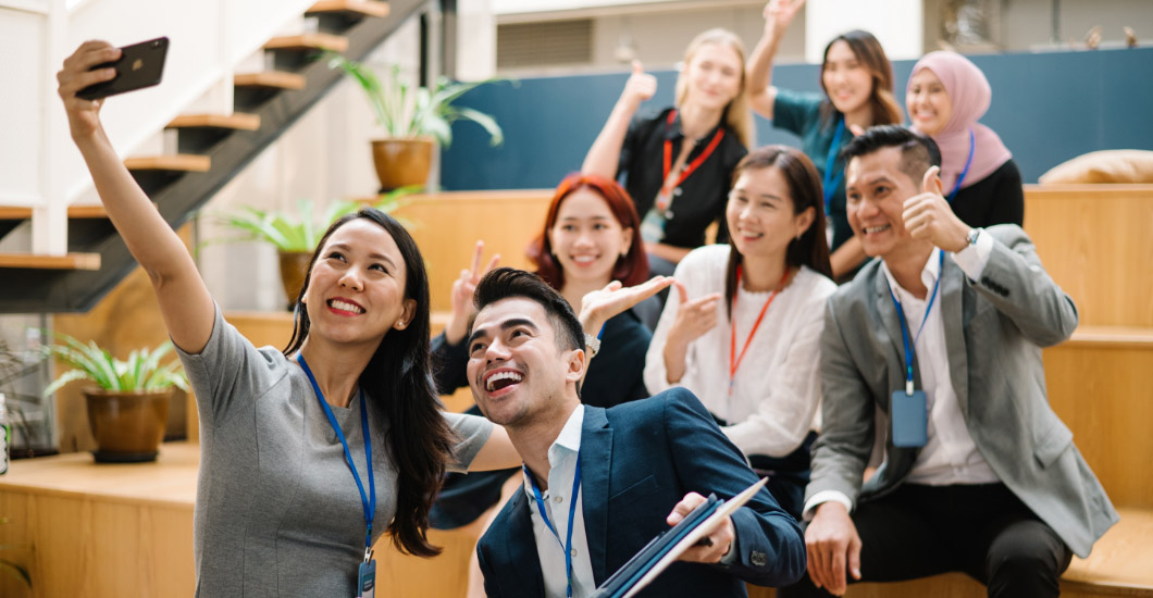 A team of employees taking a photo together.