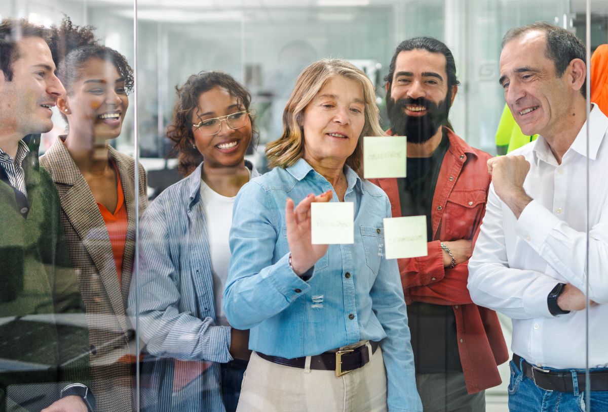 Employees reviewing ideas in a meeting