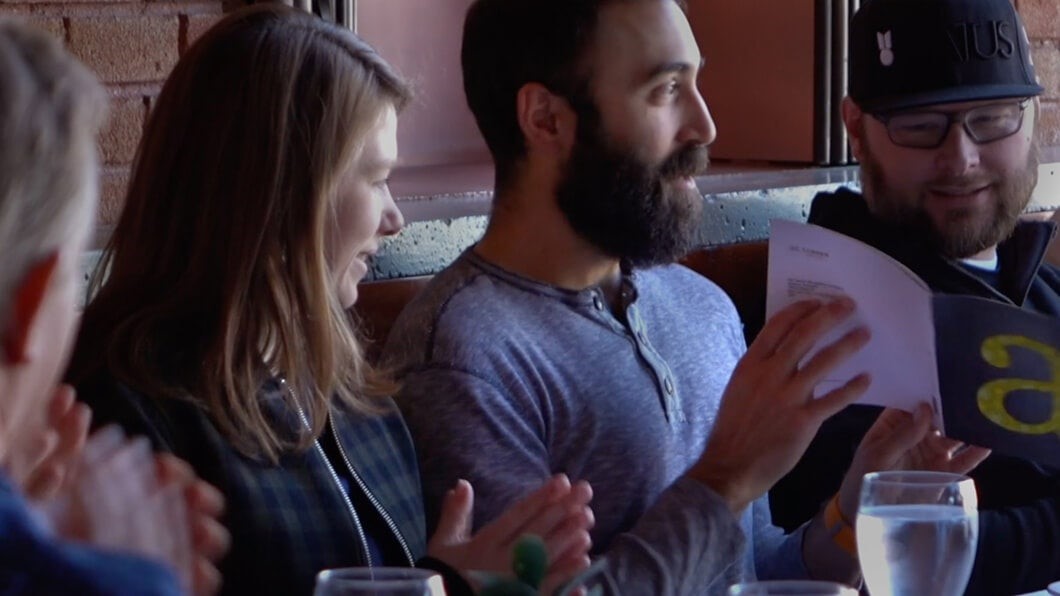 Teammates celebrating a work anniversary together.