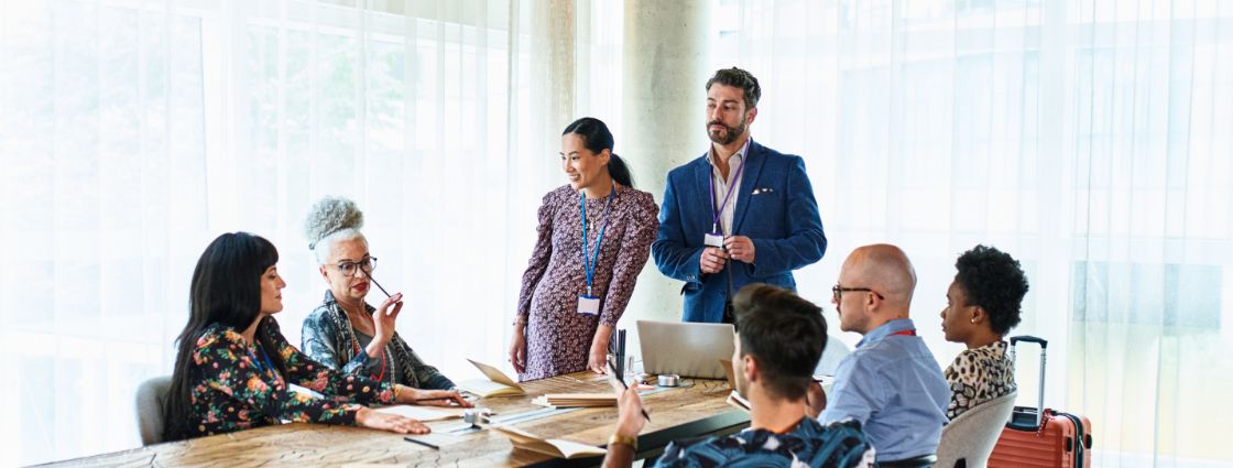 Employees holding a meeting in an office