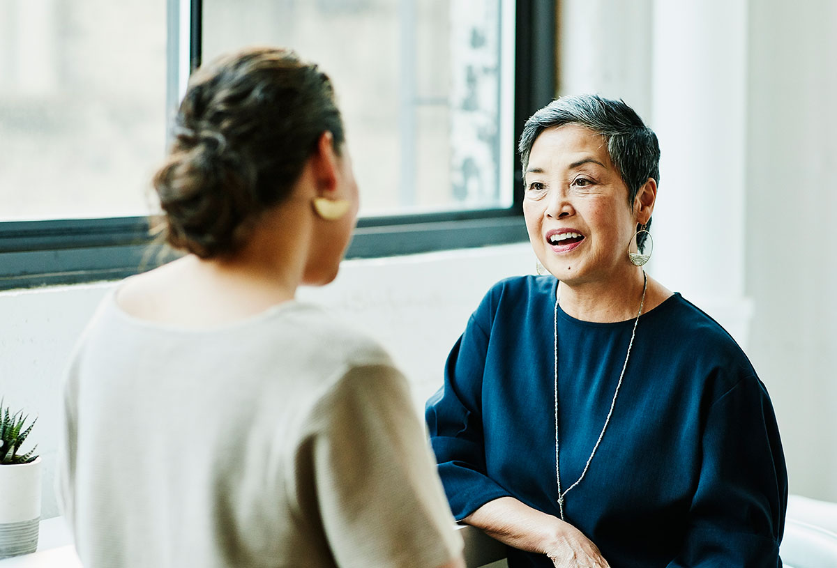 An employee and a manager in a one on one meeting