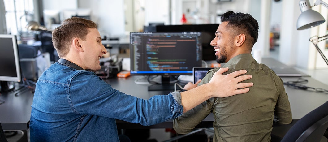 An employee appreciating the work of a coworker