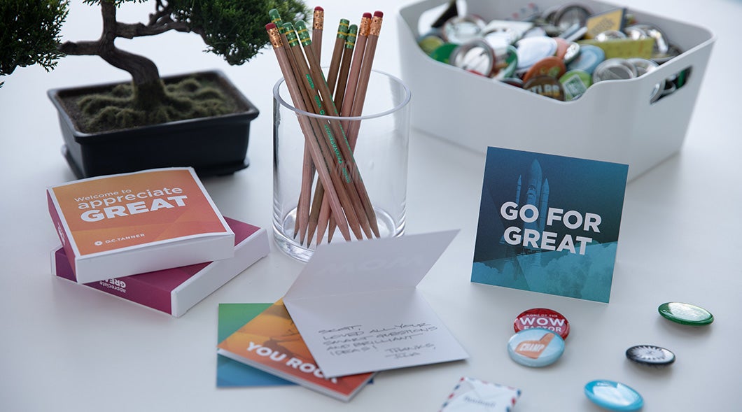 Coworkers celebrating in an office.