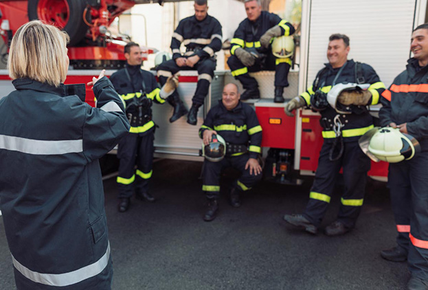 A group of firefighters having a team meeting.