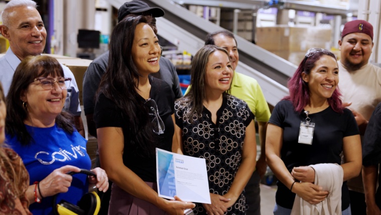 O.C. Tanner employees during an award presentation