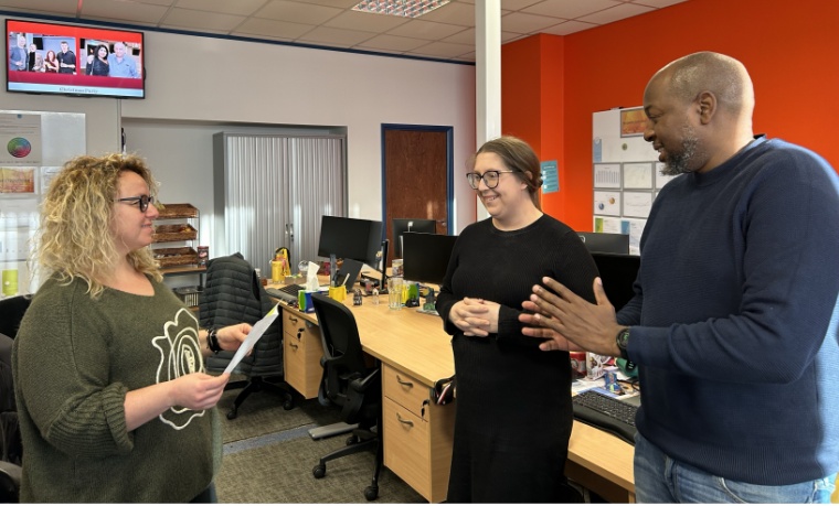 O.C. Tanner employees in the European office during a recognition award presentation