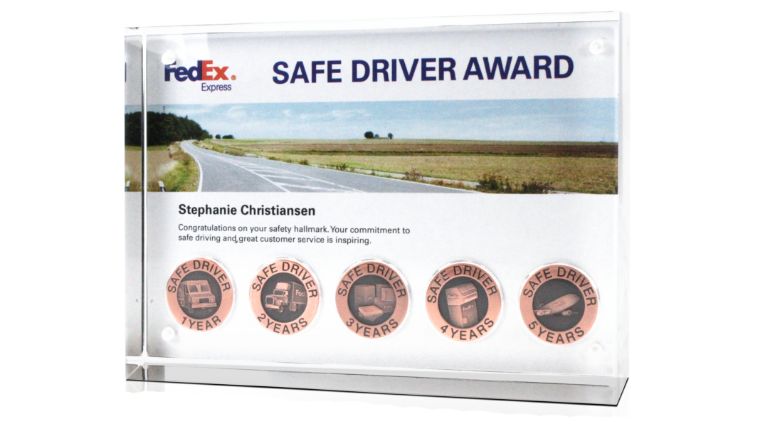 Fedex Safe Driver collectible award coins designed by O.C. Tanner
