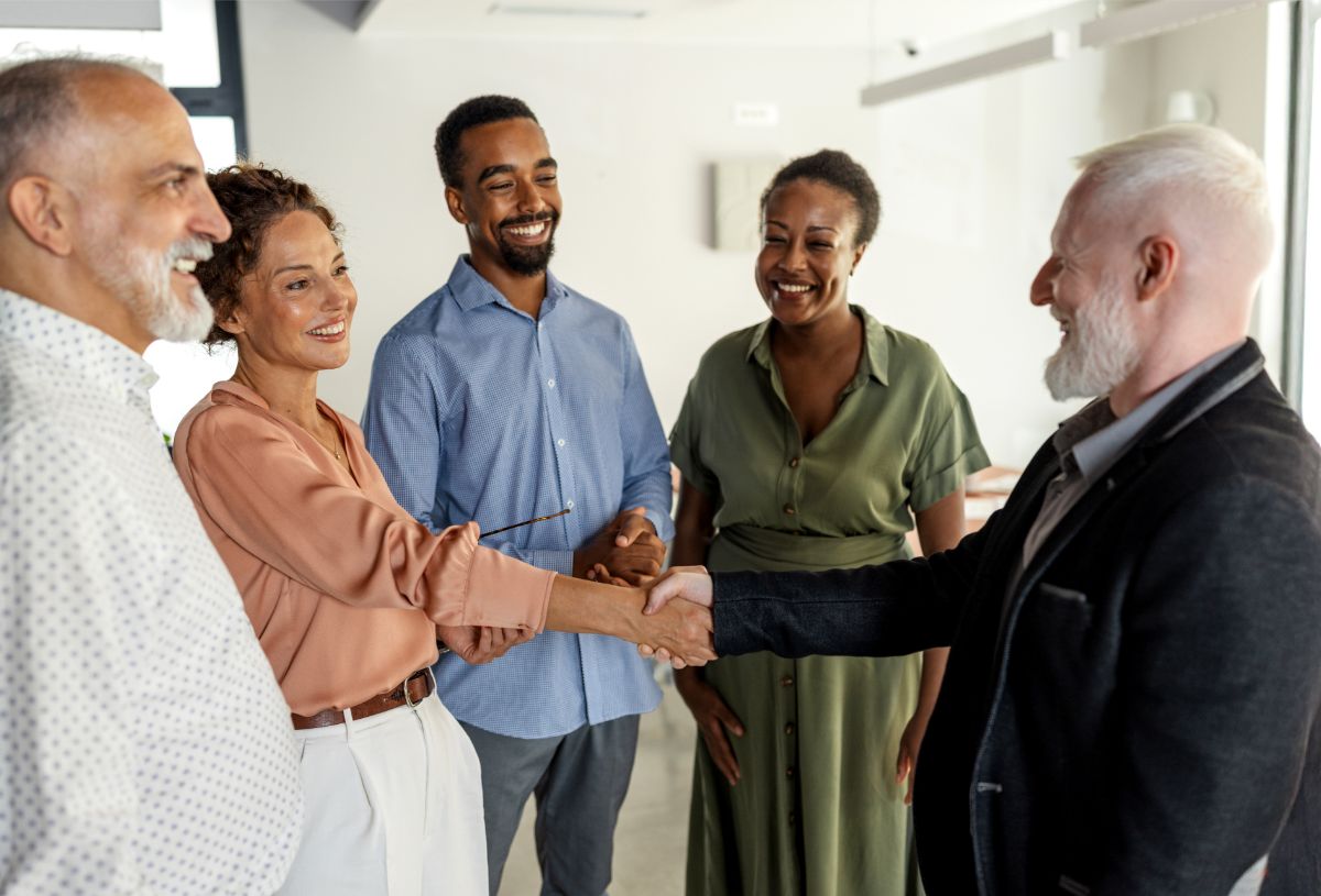 Employees shaking hands