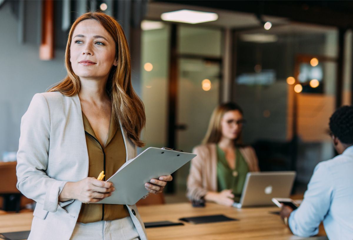 An employee holding a clipboard