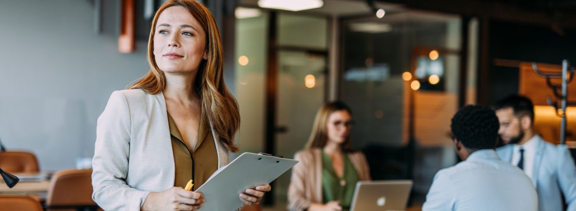 An employee holding a clipboard