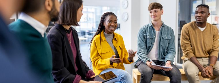 Employees in a meeting together