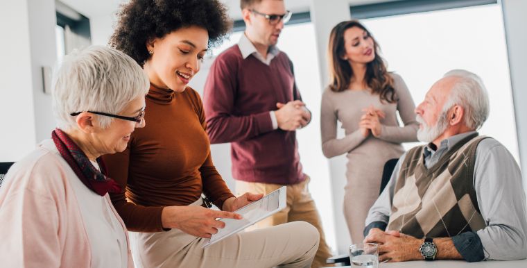 Employees of different generations collaborating in the office