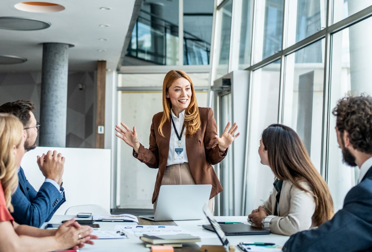 Employees in a meeting room together