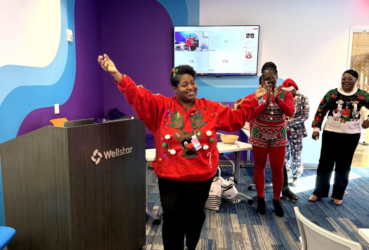 Wellstar employees celebrating during a holiday event