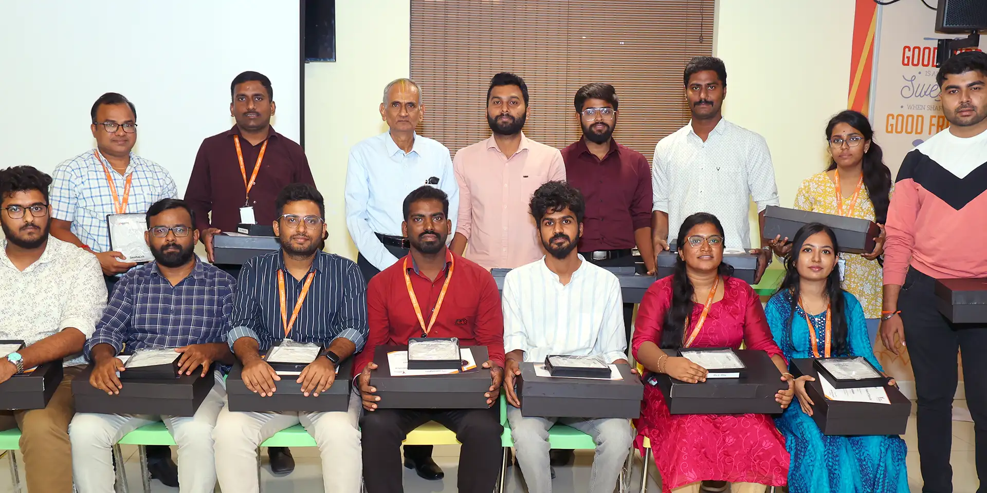 Newgen employees with their 5-year career anniversary awards from O.C. Tanner.