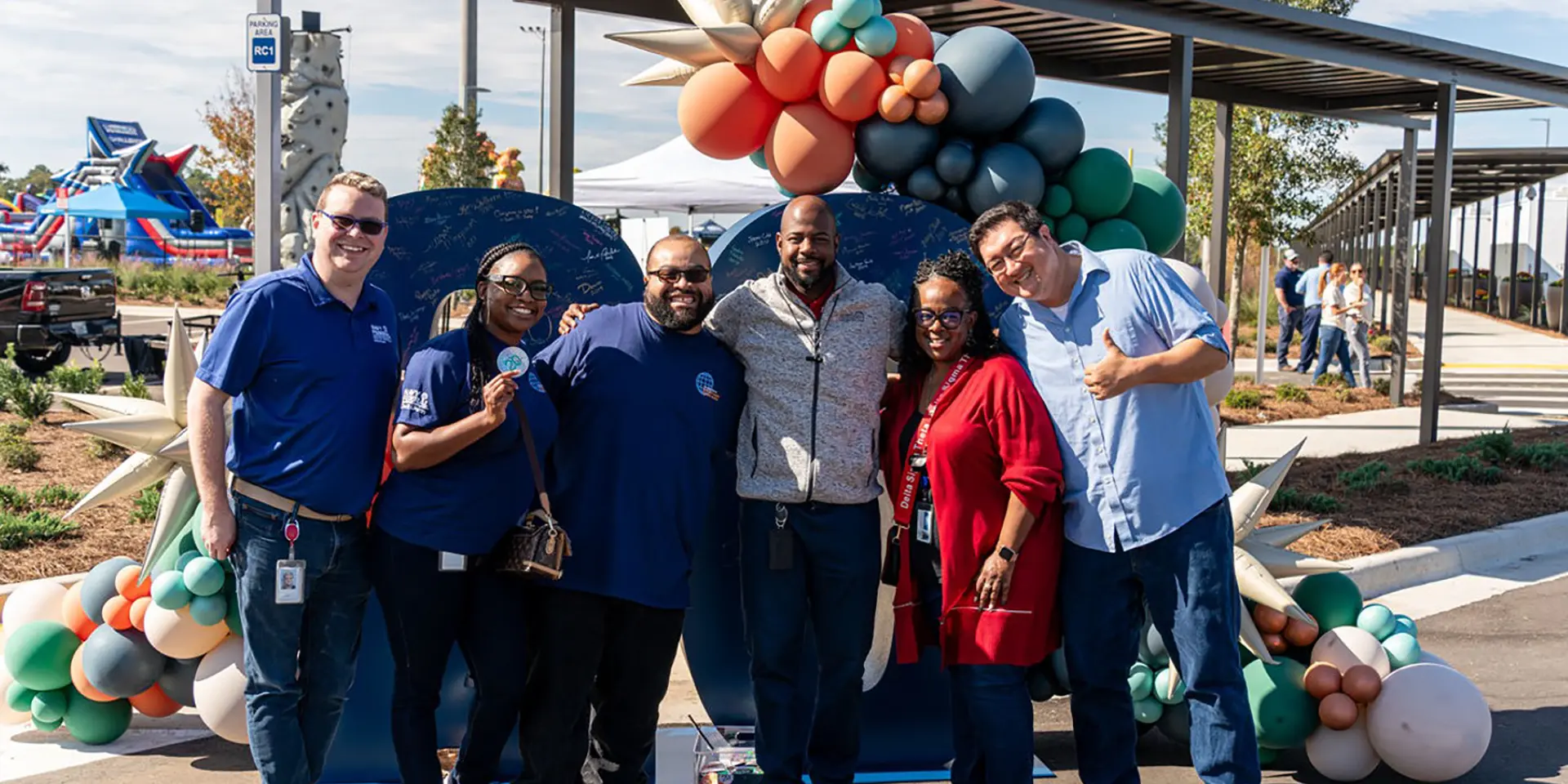 Navy Federal Credit Union employees volunteering at an outdoor event
