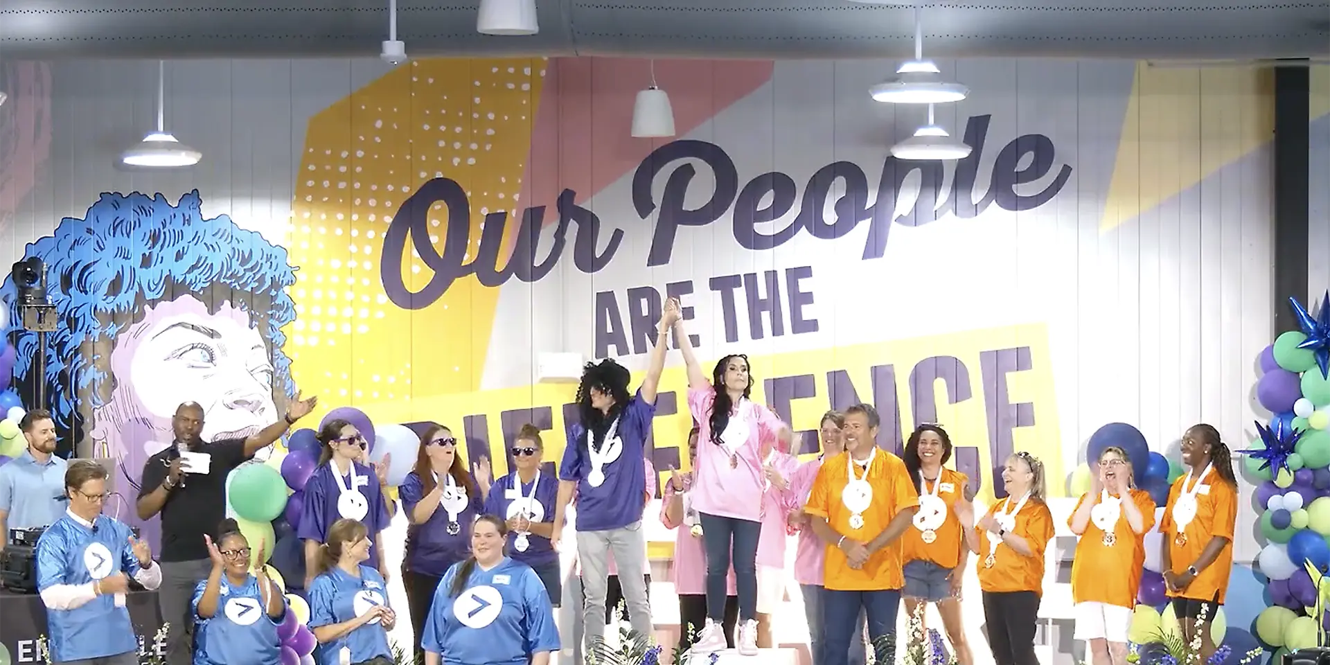 Emsemble Health Partners employees celebrating at the Ensemble Games