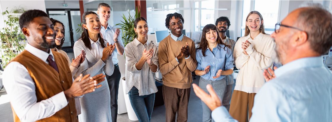 Employees celebrating together in an office