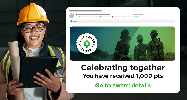 An employee receiving a group points deposit from O.C. Tanner's recognition platform.