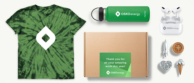 Swag boxes, custom-branded merchandise, and symbolic pins, curated and manufactured by O.C. Tanner.