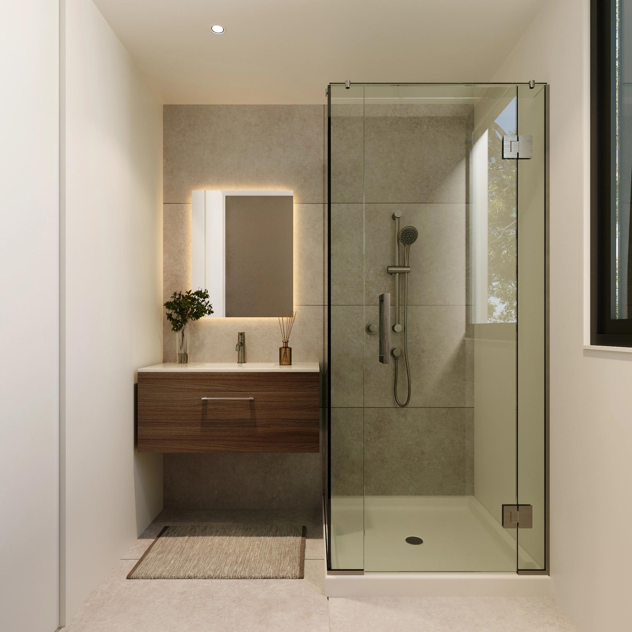 Modern bathroom with glass shower enclosure, gray tiles, floating wooden vanity, and lighted mirror.