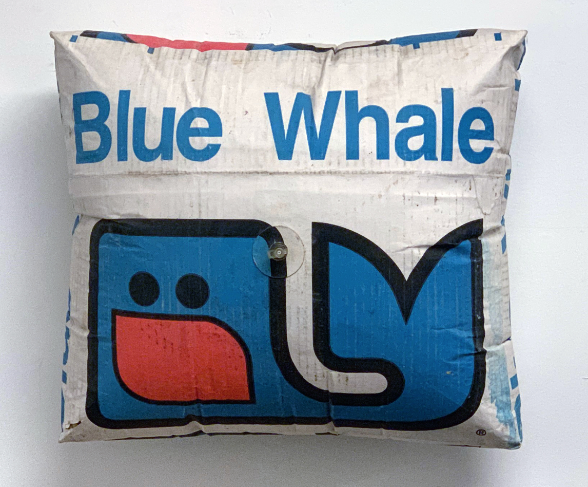 Clive Murphy "Inflatable Cardboard Box (Blue Whale)", 2004 Deconstructed cardboard, PVC, wood, valve, artist’s air 6 × 18 × 9 in 40.6 × 45.7 × 22.9 cm Courtesy of Elijah Wheat Showroom.