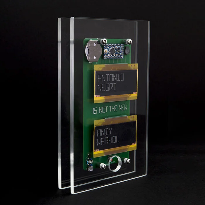 Rafael Lozano-Hemmer, X is not the new Y X is not the new Y (2011) Electronic paper screens, arduino processor, battery, circuit board. 6.5 x 3.4 x .71 in / 16.5 x 8.6 x 1.8 cm Edition 25 of 100 + 3 AP. Courtesy of bitforms and the artist.