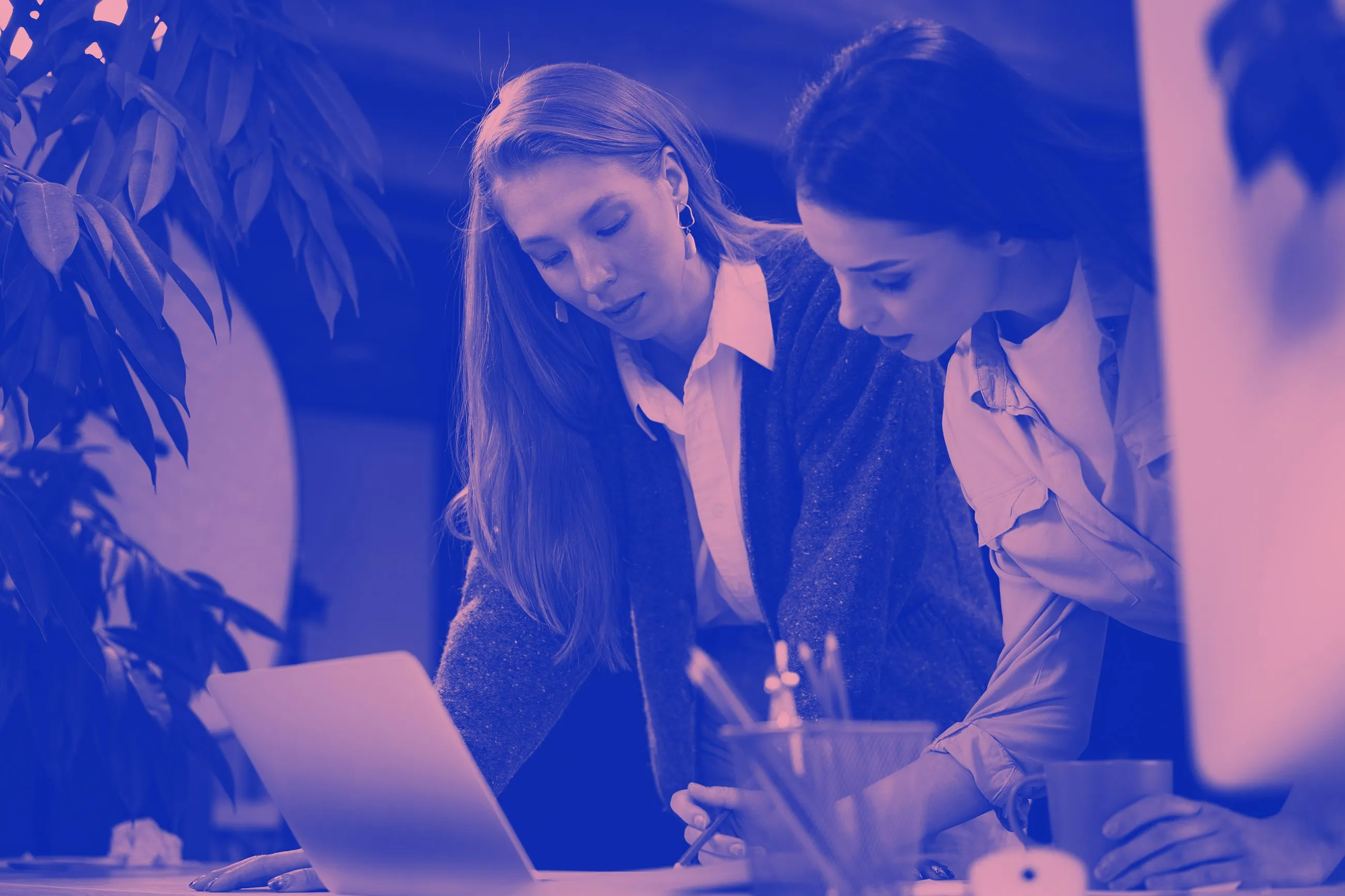 Two woman working together