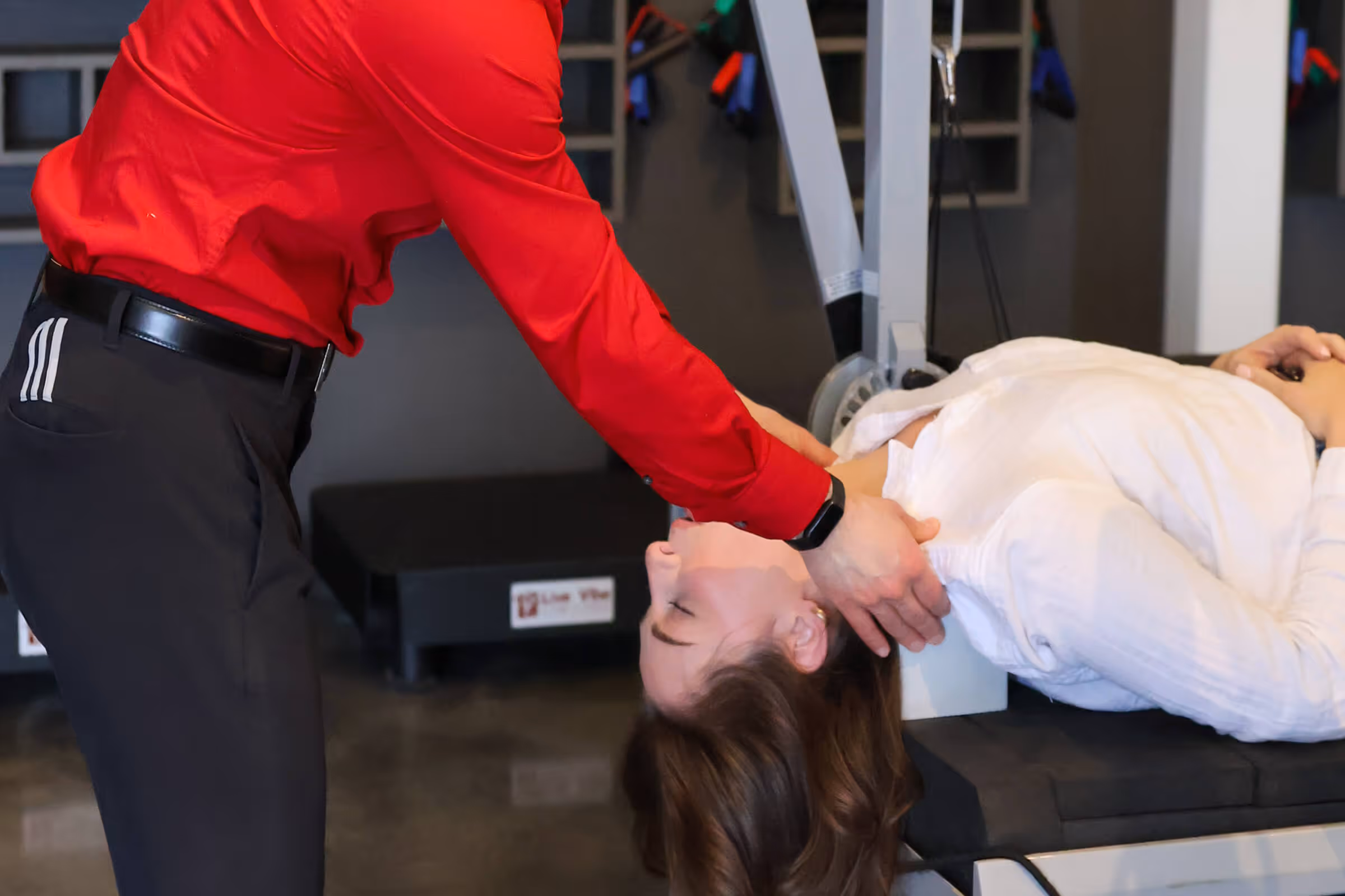 Alternative medicine practitioner providing hands-on therapeutic care for pain relief