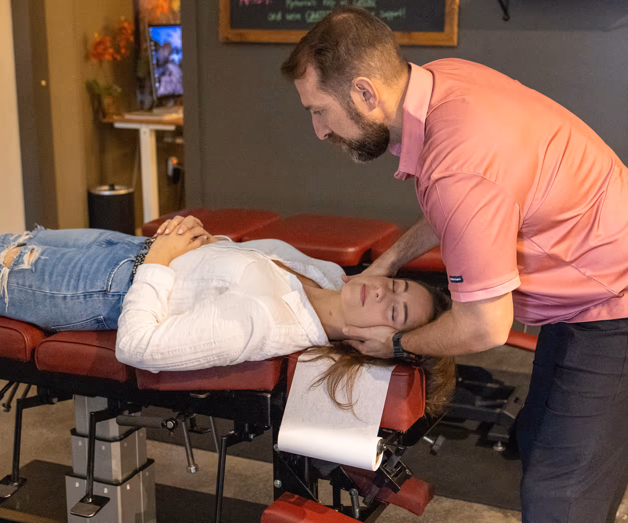 Patient receiving knee and joint pain treatment with chiropractic rehabilitation techniques