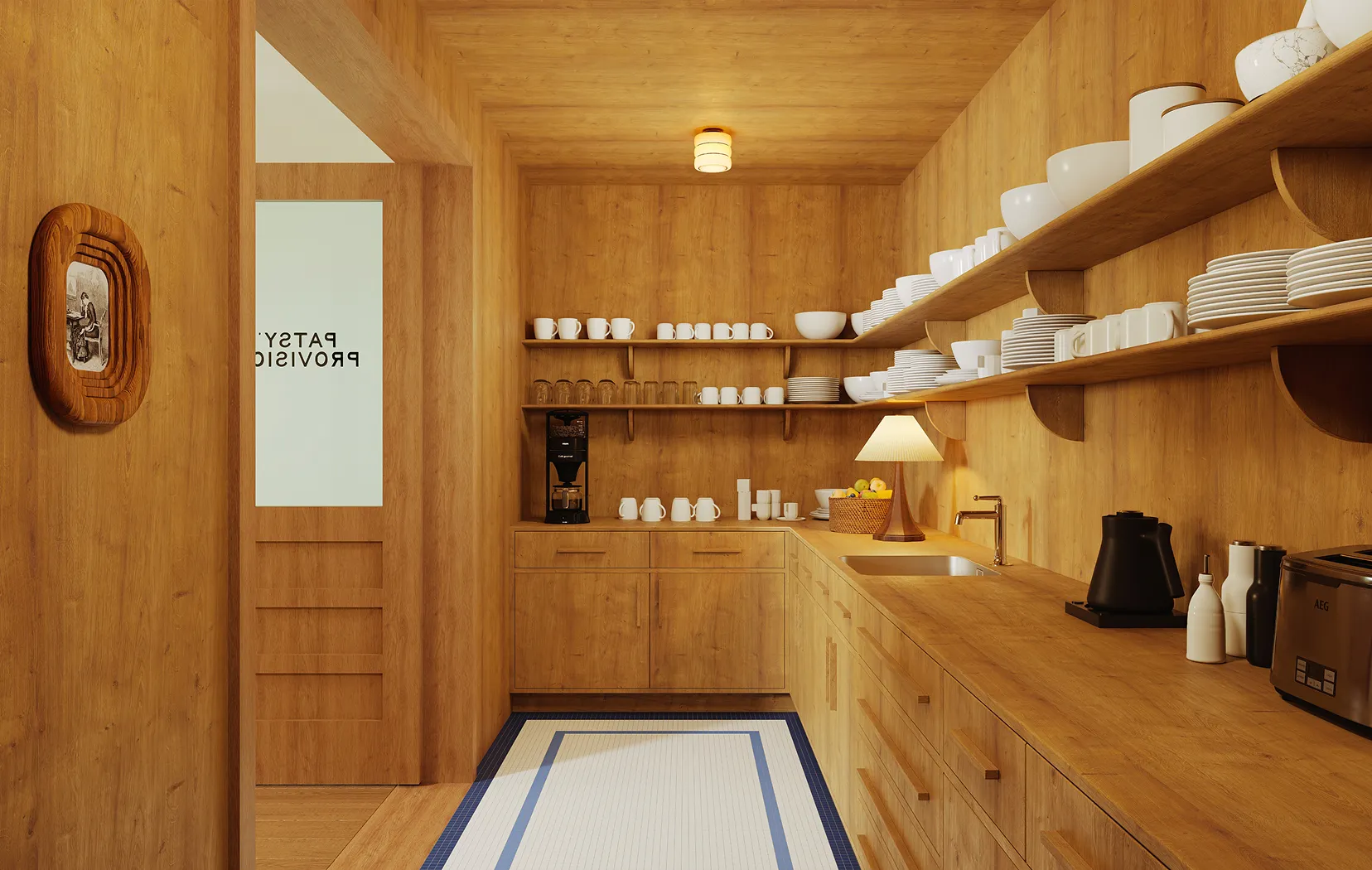 Cozy wooden kitchen with open shelves holding white bowls, plates, mugs, a coffee maker, and a basket of fruit, illuminated by a table lamp.