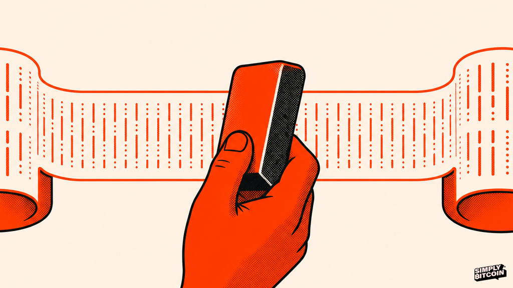 An eraser presses against an endless paper ticker tape that keeps unrolling untouched beneath it.