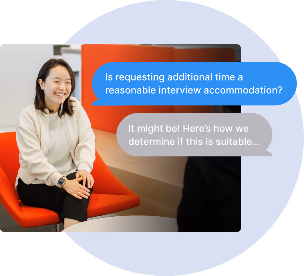 A person working on a laptop in an office