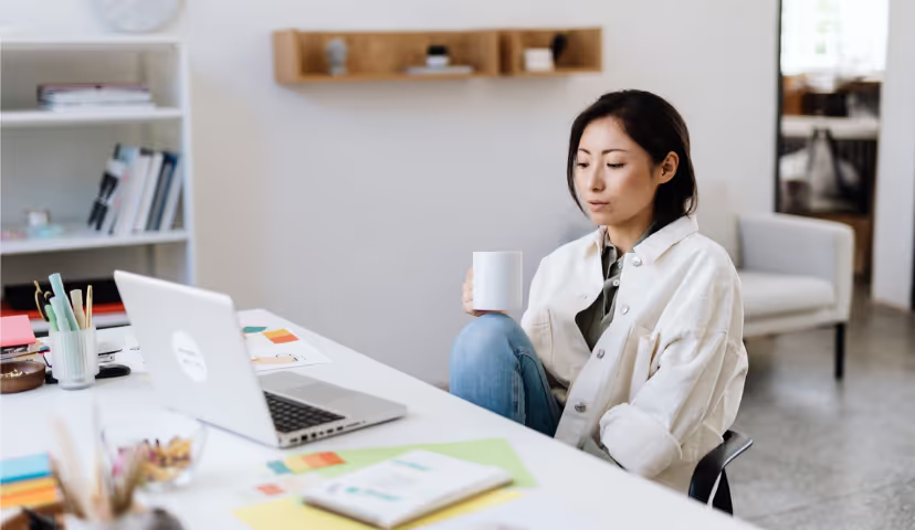 Person at their desk working from home.