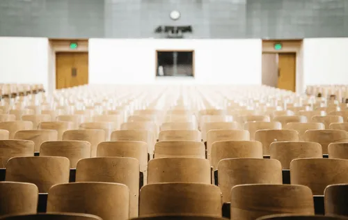 Photo of empty theatre seating.