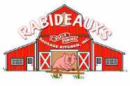 Red barn with white trim labeled Rabideauxs Sausage Kitchen, featuring a pig illustration in the doorway.