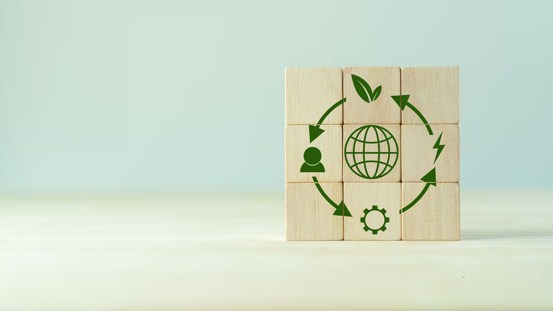 Wooden cubes representing a globe and sustainable development — CSR, sustainability and corporate environmental goals