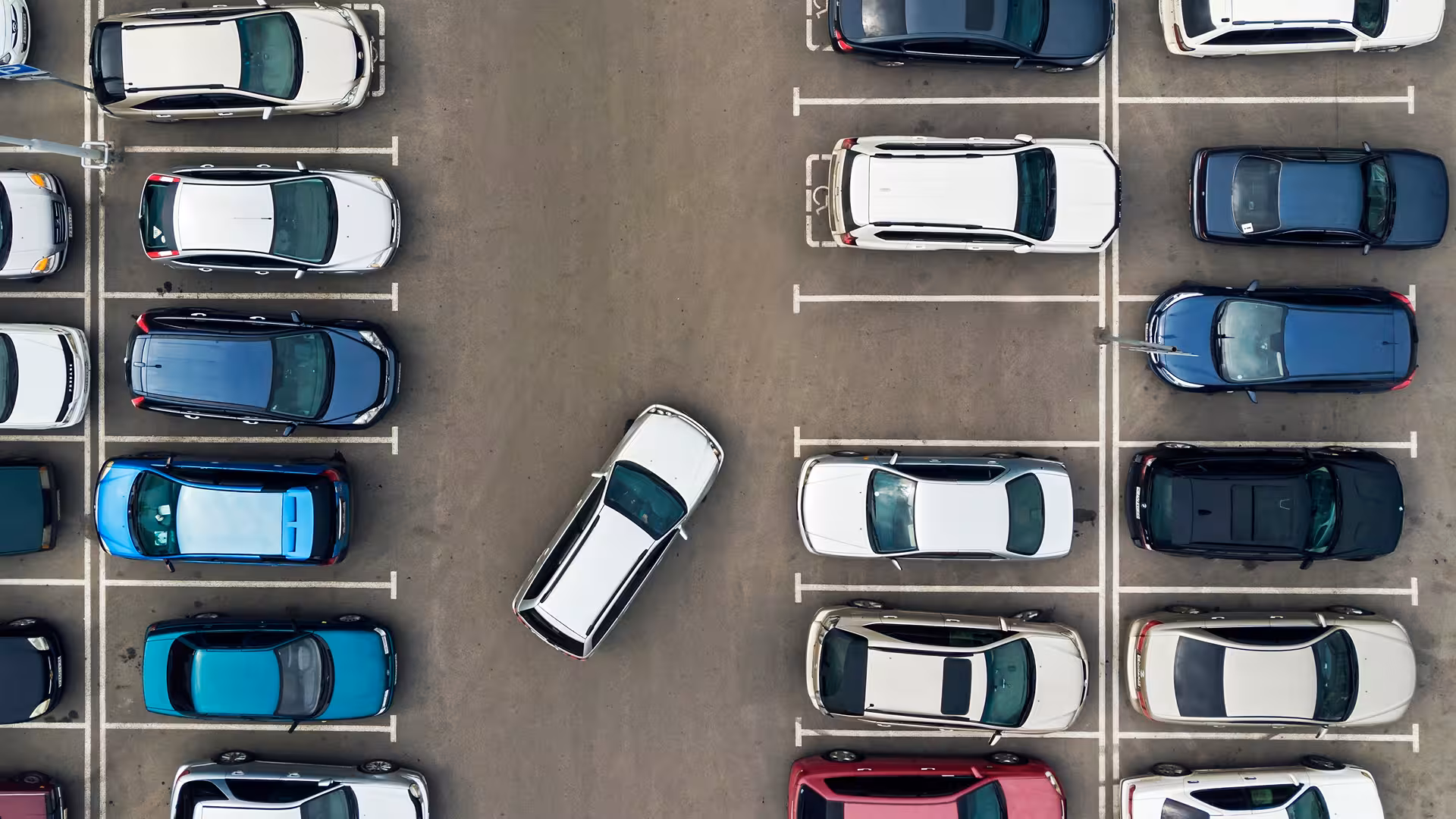 Aerial view of a car park entirely occupied by cars, illustration for Mobility and Parking