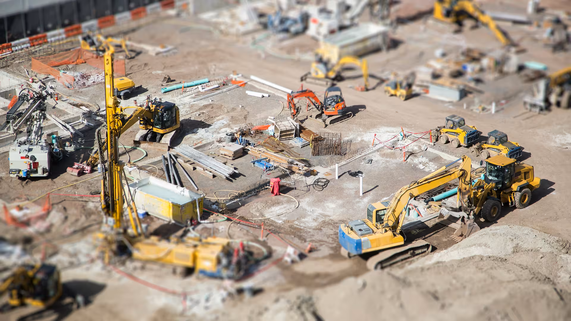 Large construction site with excavators and earthmoving machines in action, illustration for Soil pollution in Brussels