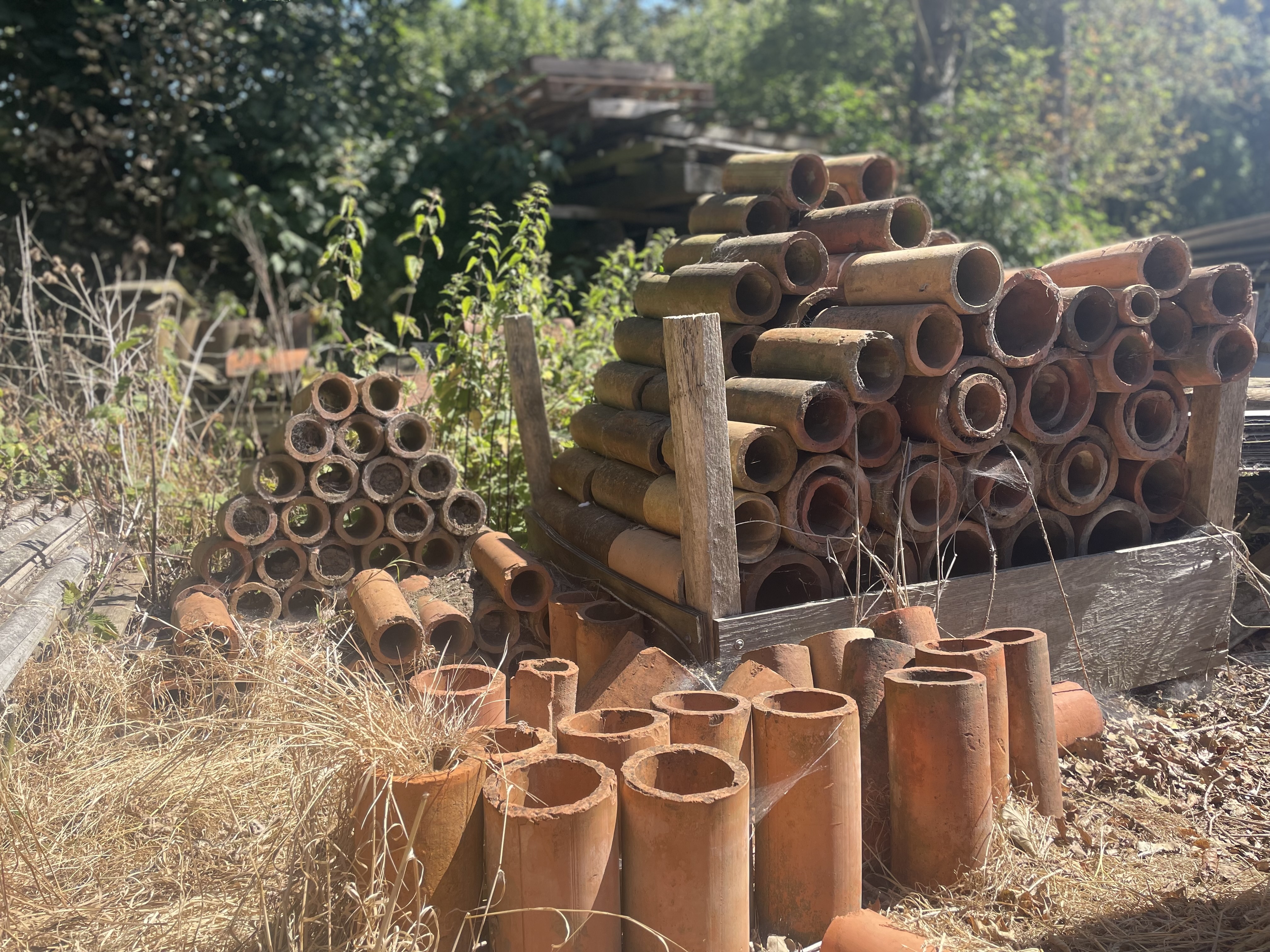 An image showing land drainage clay tile pipes