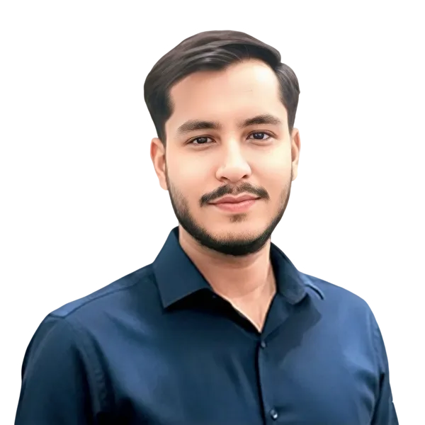 Portrait of a young man with short dark hair and a beard, wearing a dark blue button-up shirt.