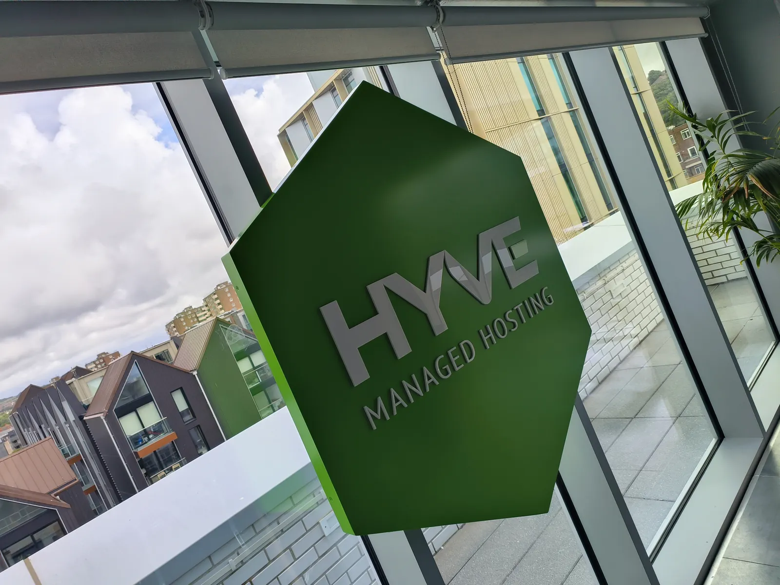 HYVE hexagonal sign on an office window